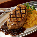 Grilled Jamaican Jerk Pork Chops with Raisin-Rum Sauce and Garlic Sweet Potatoes